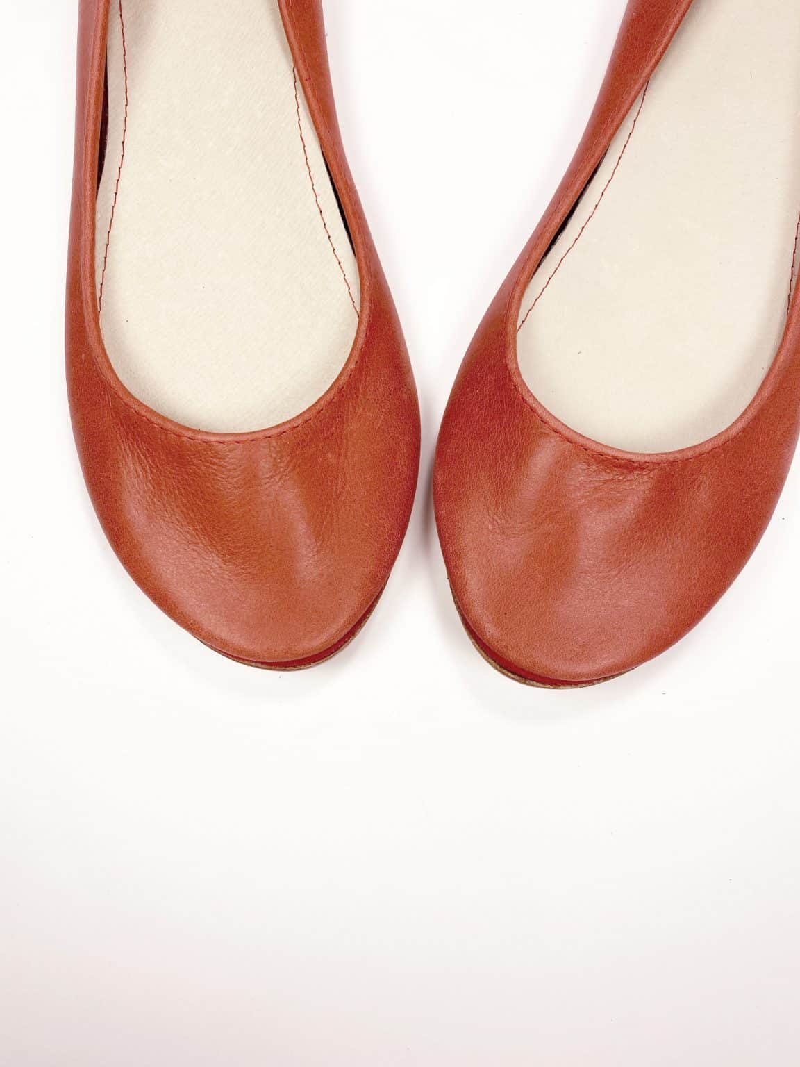 Round-toe ballet flats in warm terracotta red Italian leather with low heel and leather soles – elehandmade shoes