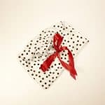 Polka dots cotton dust bag for shoes tied with ivory satin ribbon