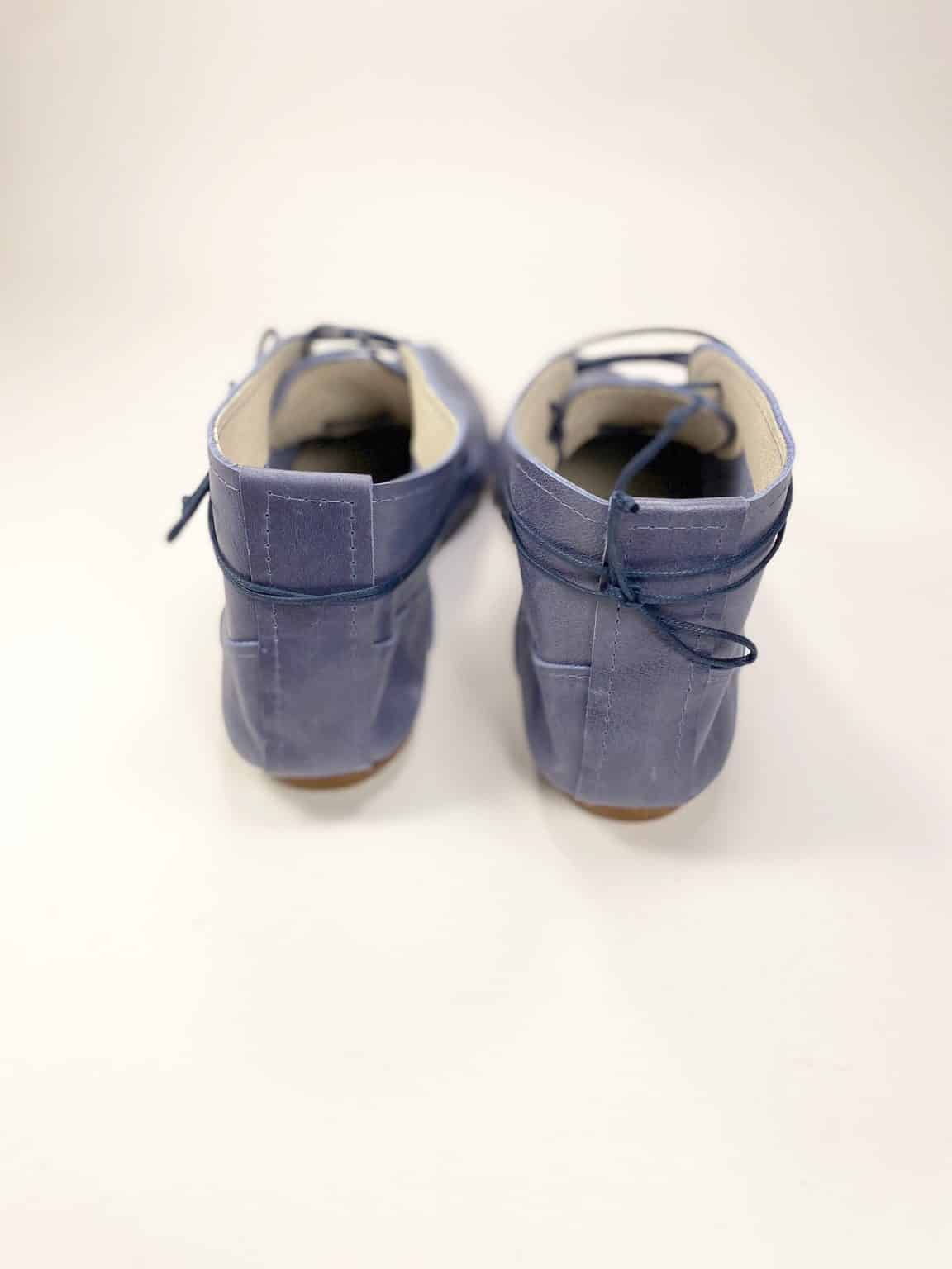 Back view of handcrafted blue leather lace-up shoes, Italian artisan footwear