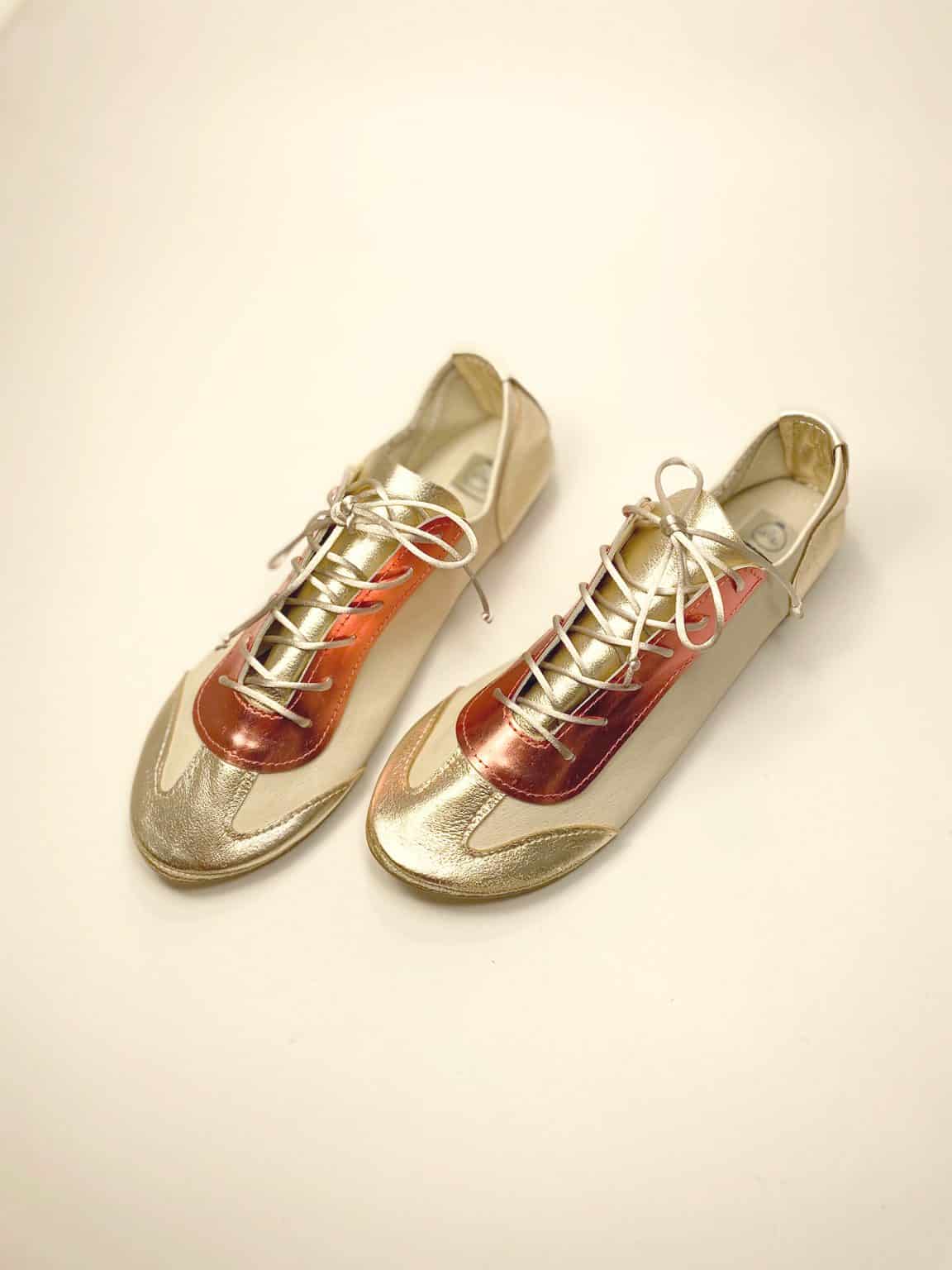 Retro Chic Trainers handmade in metallic gold and coral Italian leather side view