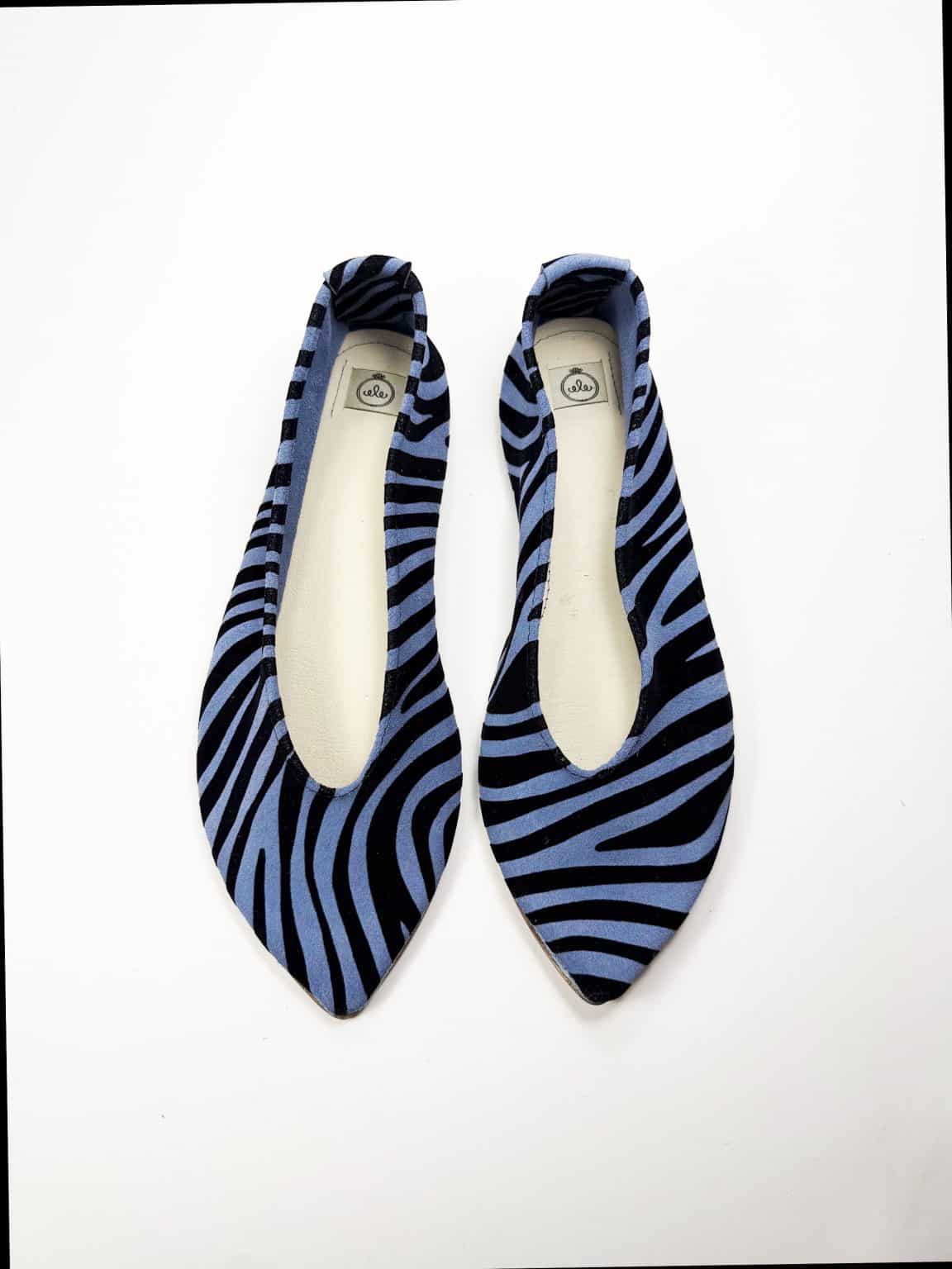 Handmade pointy toe flats in black and blue printed zebra Italian leather