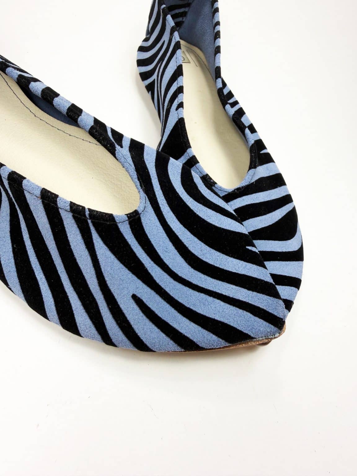 Handmade pointy toe flats in black and blue printed zebra Italian leather