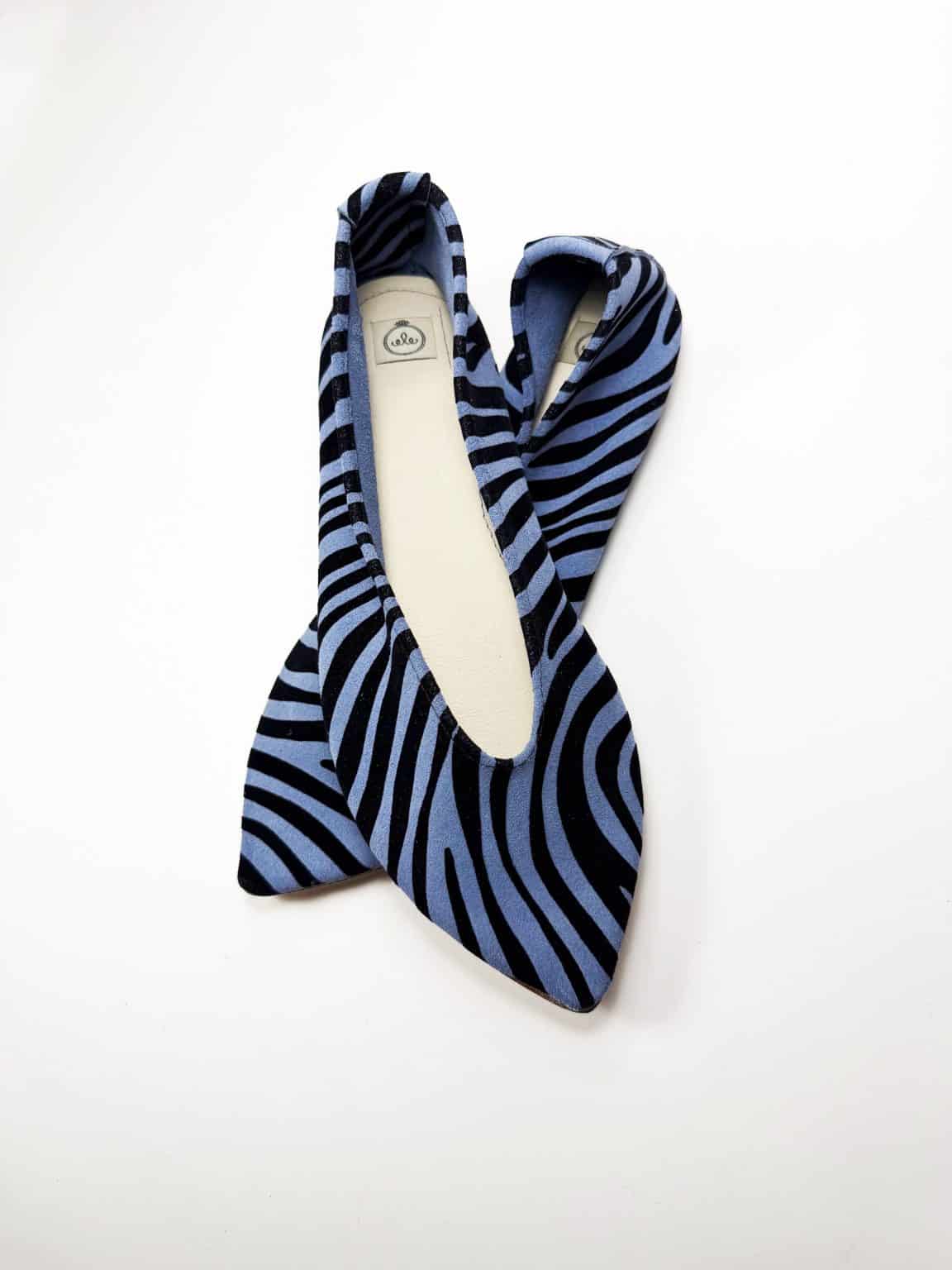 Handmade pointy toe flats in black and blue printed zebra Italian leather
