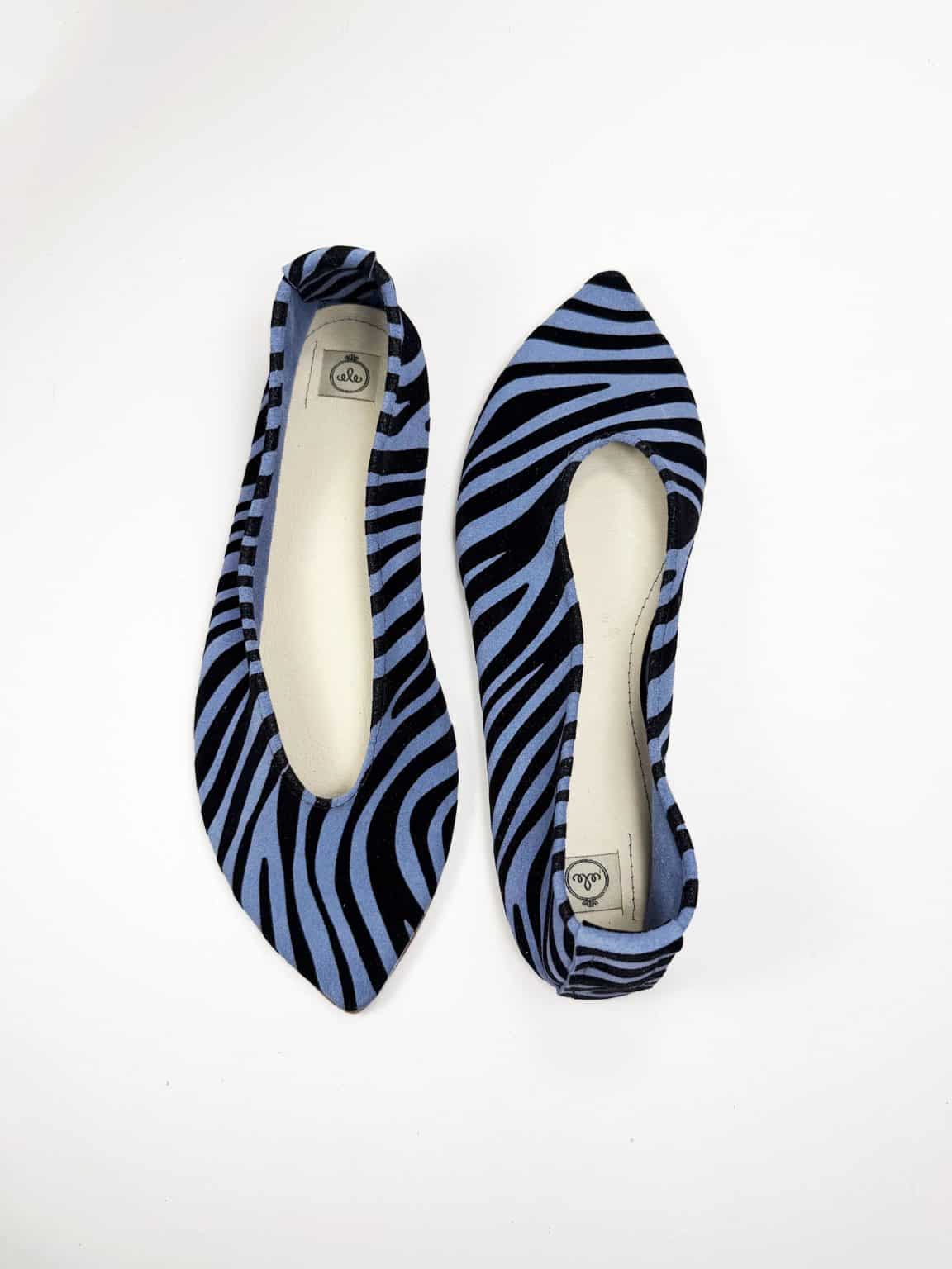 Handmade pointy toe flats in black and blue printed zebra Italian leather