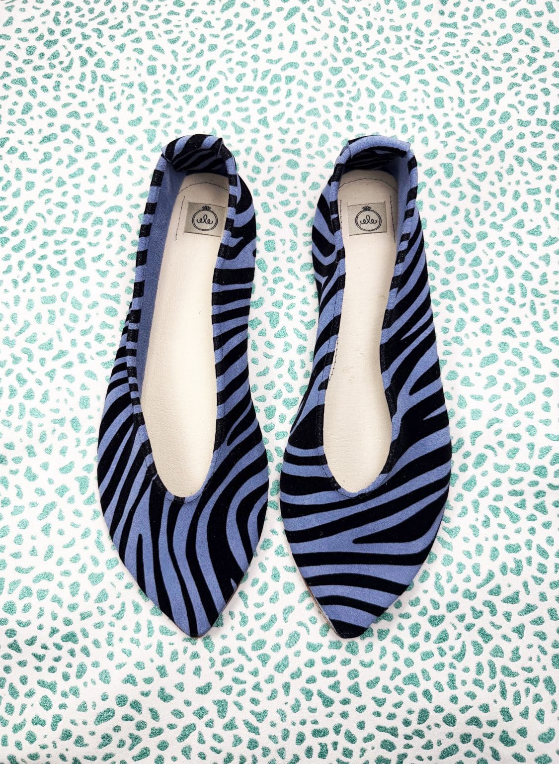 Handmade pointy toe flats in black and blue printed zebra Italian leather